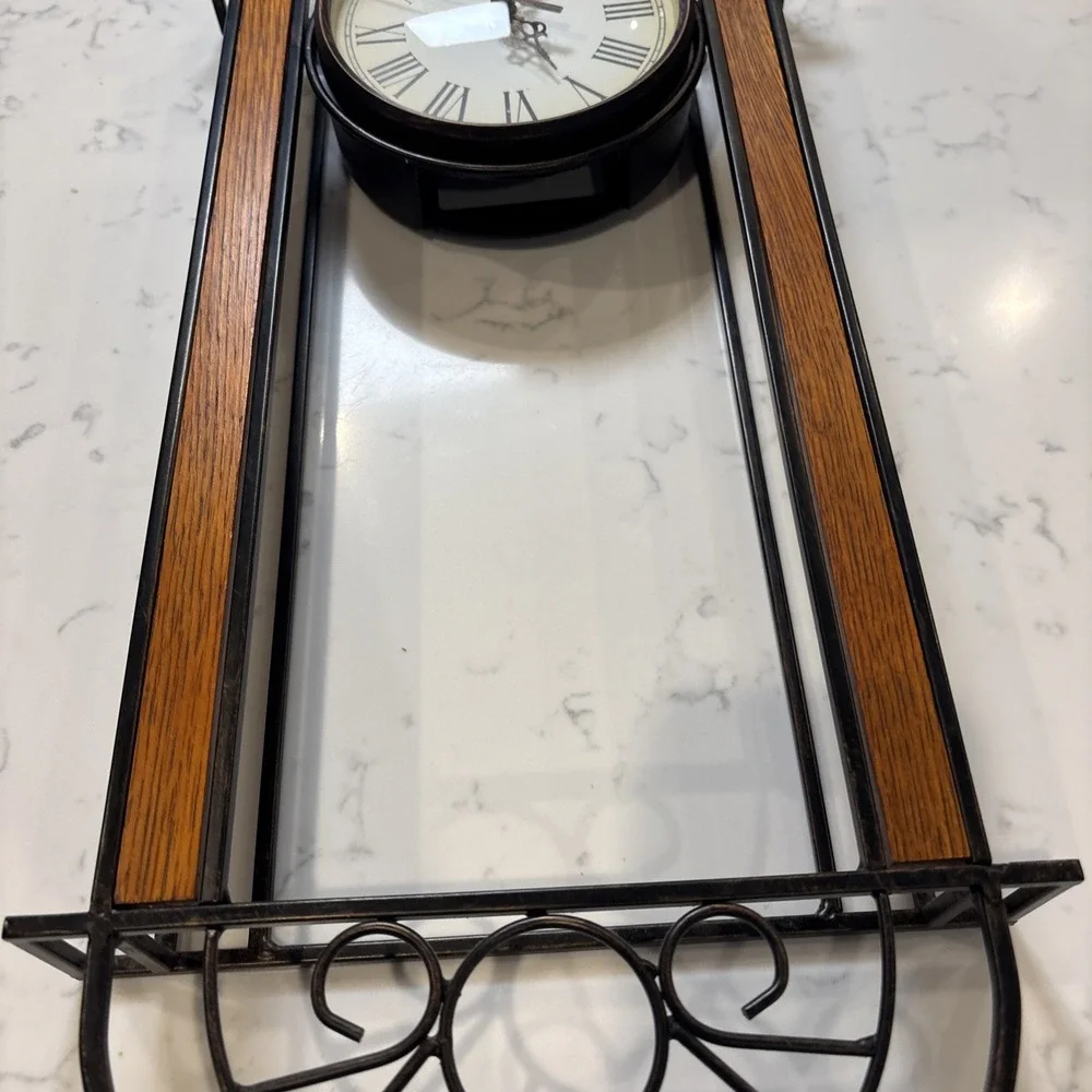 Howard Miller Devahn Wall Clock Antique Bronze Wrought Iron Roman Numeral 625241